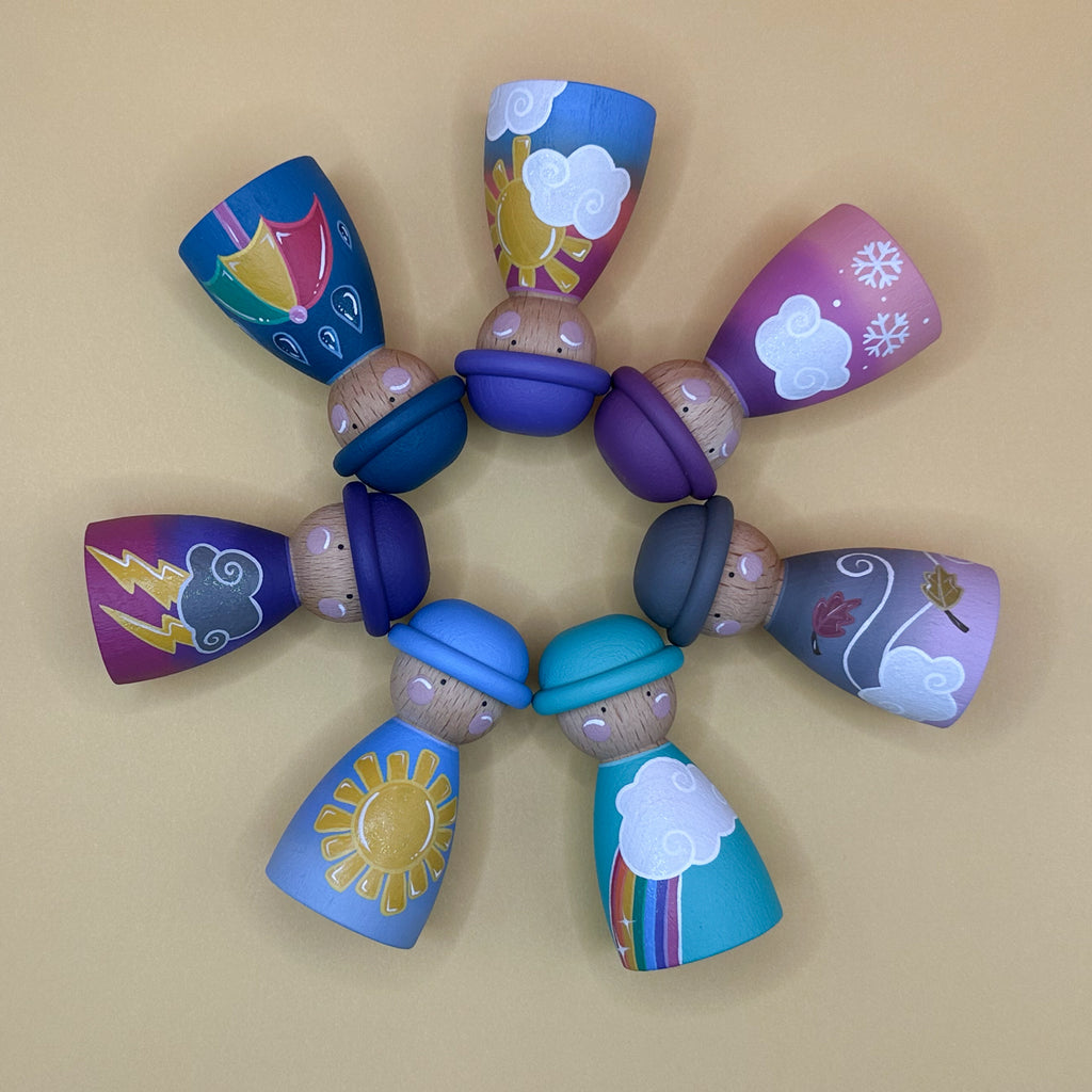 Colorful children's toy with various designs on a beige background