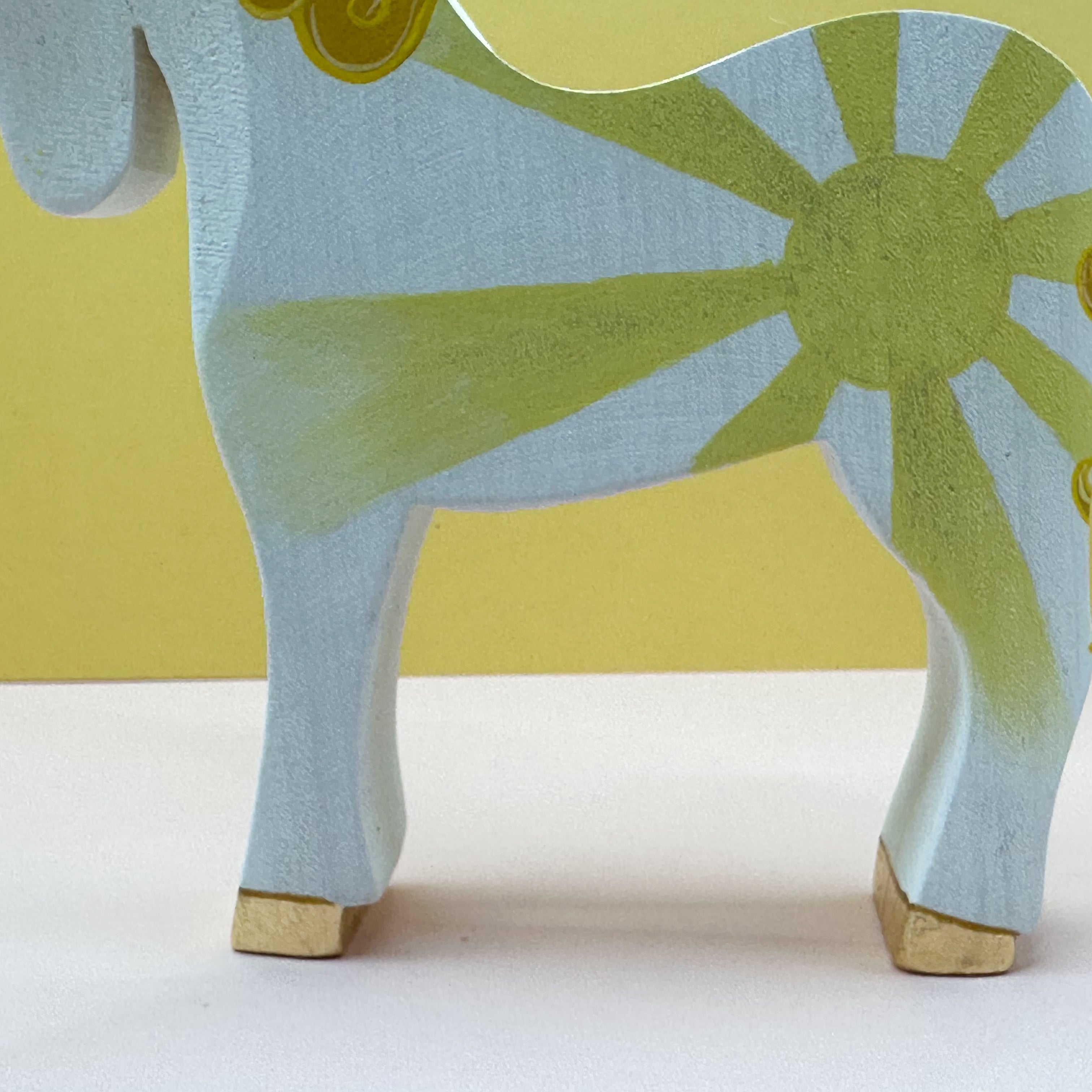 Wooden horse figurine on a white background