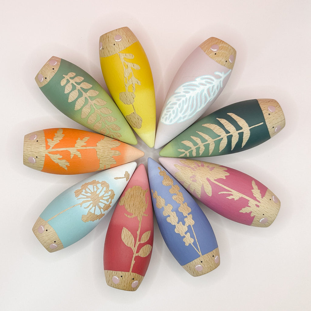 Decorative toys with floral patterns on a white background