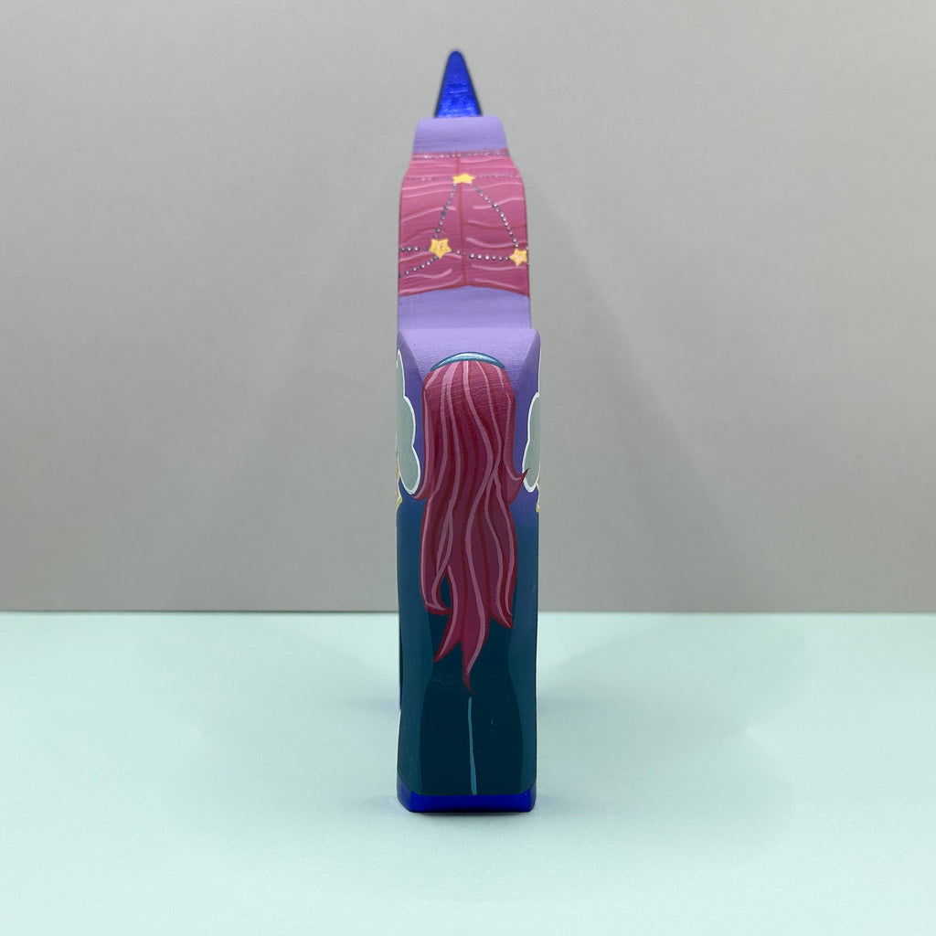 Colorful unicorn with a pink tail on a gray background