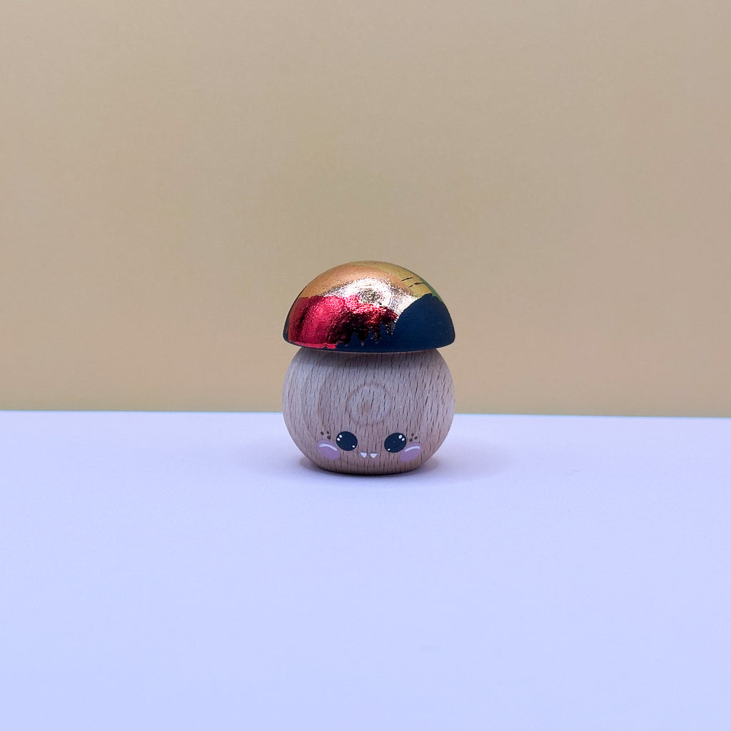 Decorative mushroom with a colorful cap on a plain background